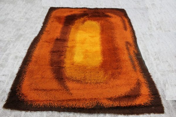 Mid Century Modern orange shag rug |