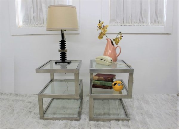 Pair of Stainless steel and glass end tables |