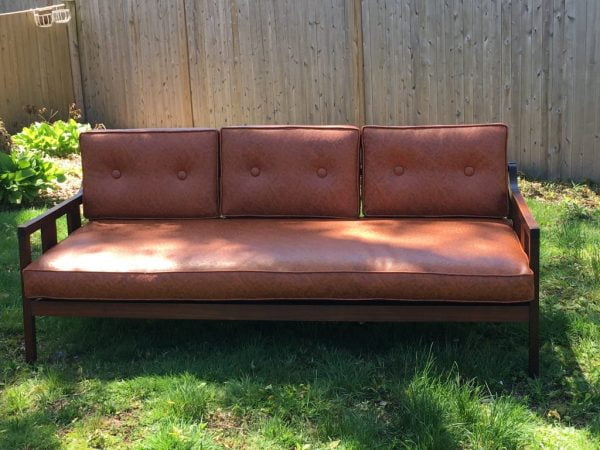 Wooden sofa / daybed upholstered in faux leather |