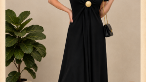 Black maxi dress with gold brooch